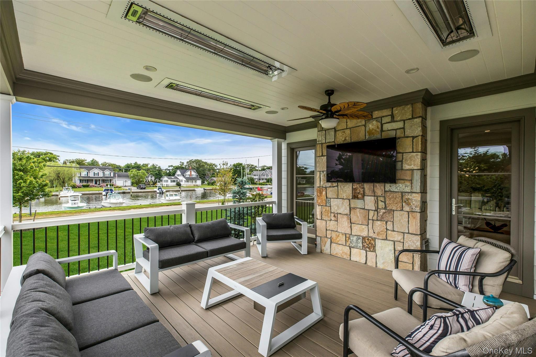52 Concourse East Brightwaters, NY 11718 - Photo 39 of 49 a building outdoor space with patio furniture