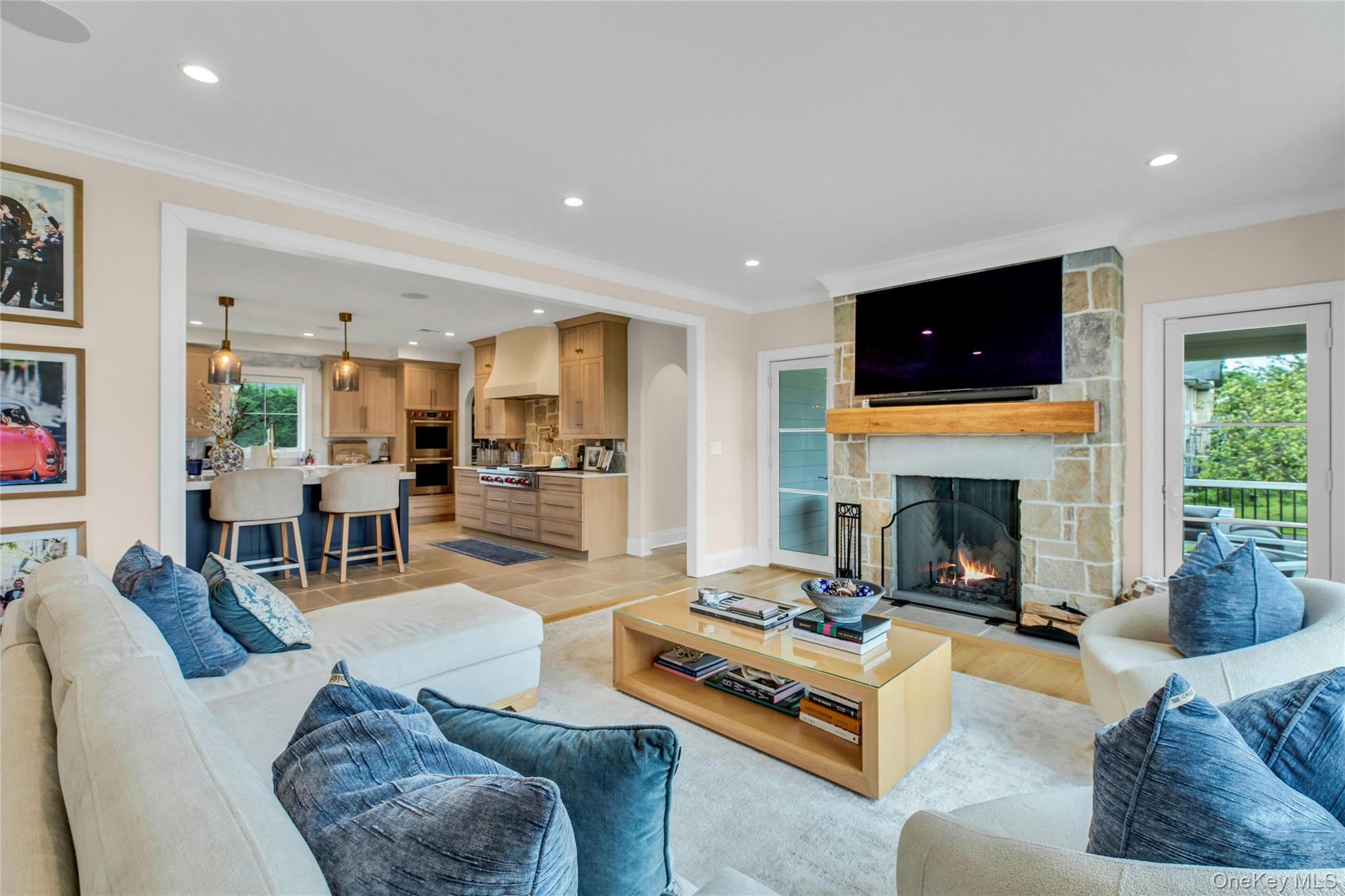 52 Concourse East Brightwaters, NY 11718 - Photo 4 of 49 a living room with furniture fireplace and flat screen tv