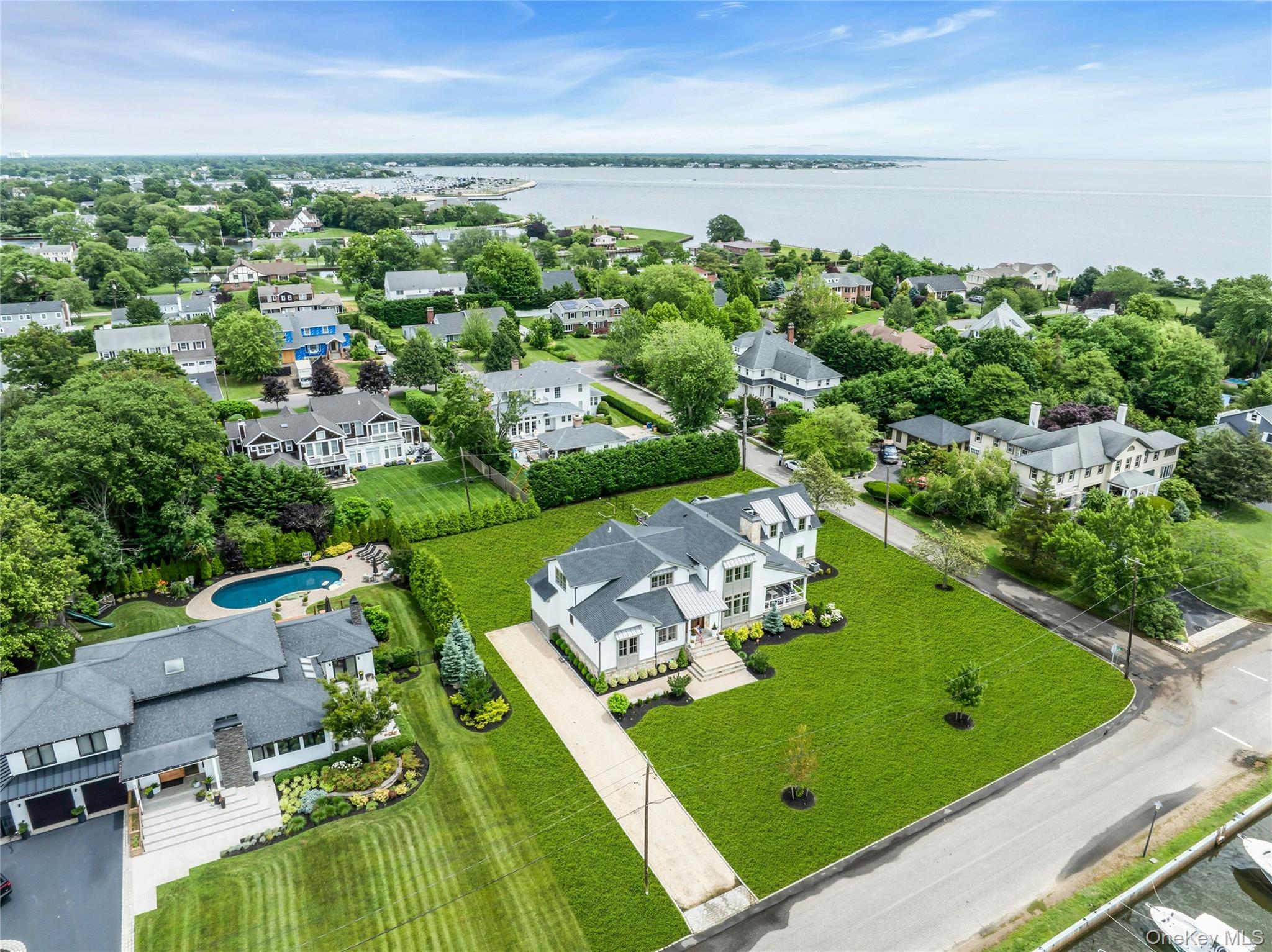 52 Concourse East Brightwaters, NY 11718 - Photo 45 of 49 an aerial view of a house with a garden