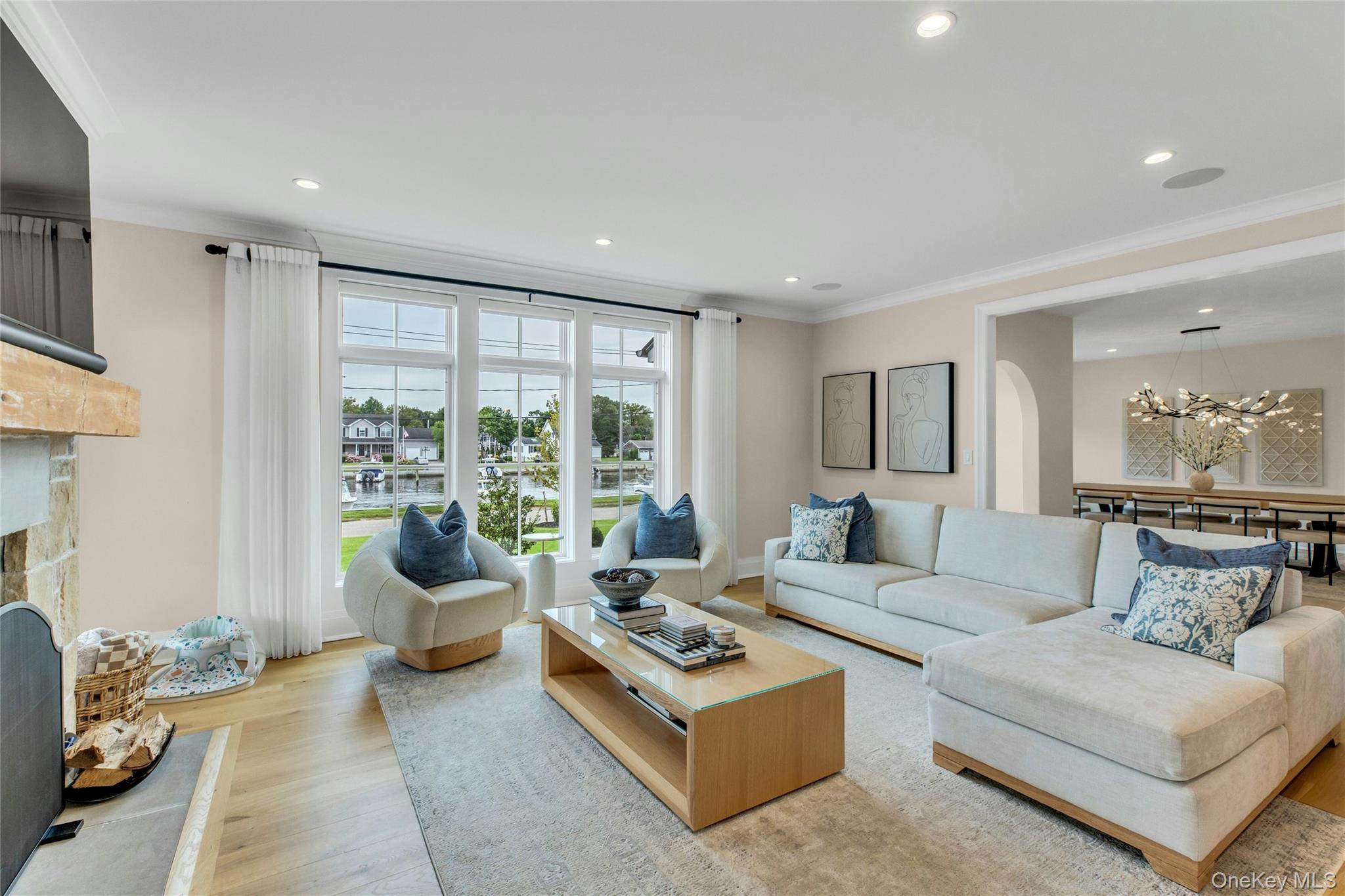 52 Concourse East Brightwaters, NY 11718 - Photo 6 of 49 a living room with furniture and a large window