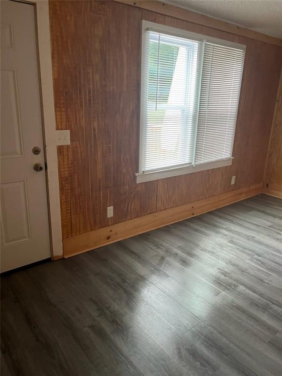3600 Grady Smith Road Loganville, GA 30052 - Photo 18 of 20 an empty room with wooden floor and windows