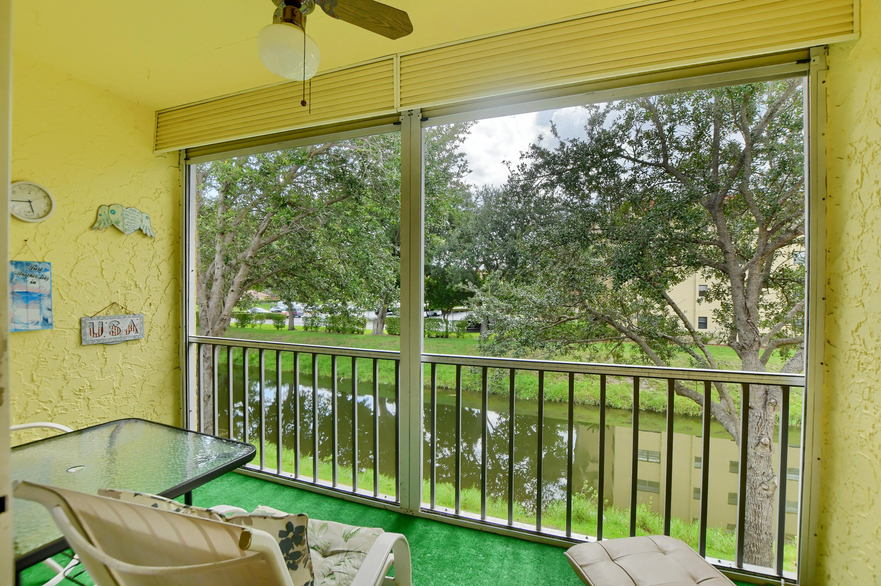 9826 Marina Boulevard, Unit 1027 Boca Raton, FL 33428 - Photo 15 of 25 a view of a balcony with lake view