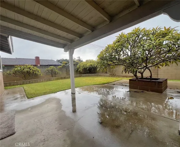 a view of a garden with an outdoor space