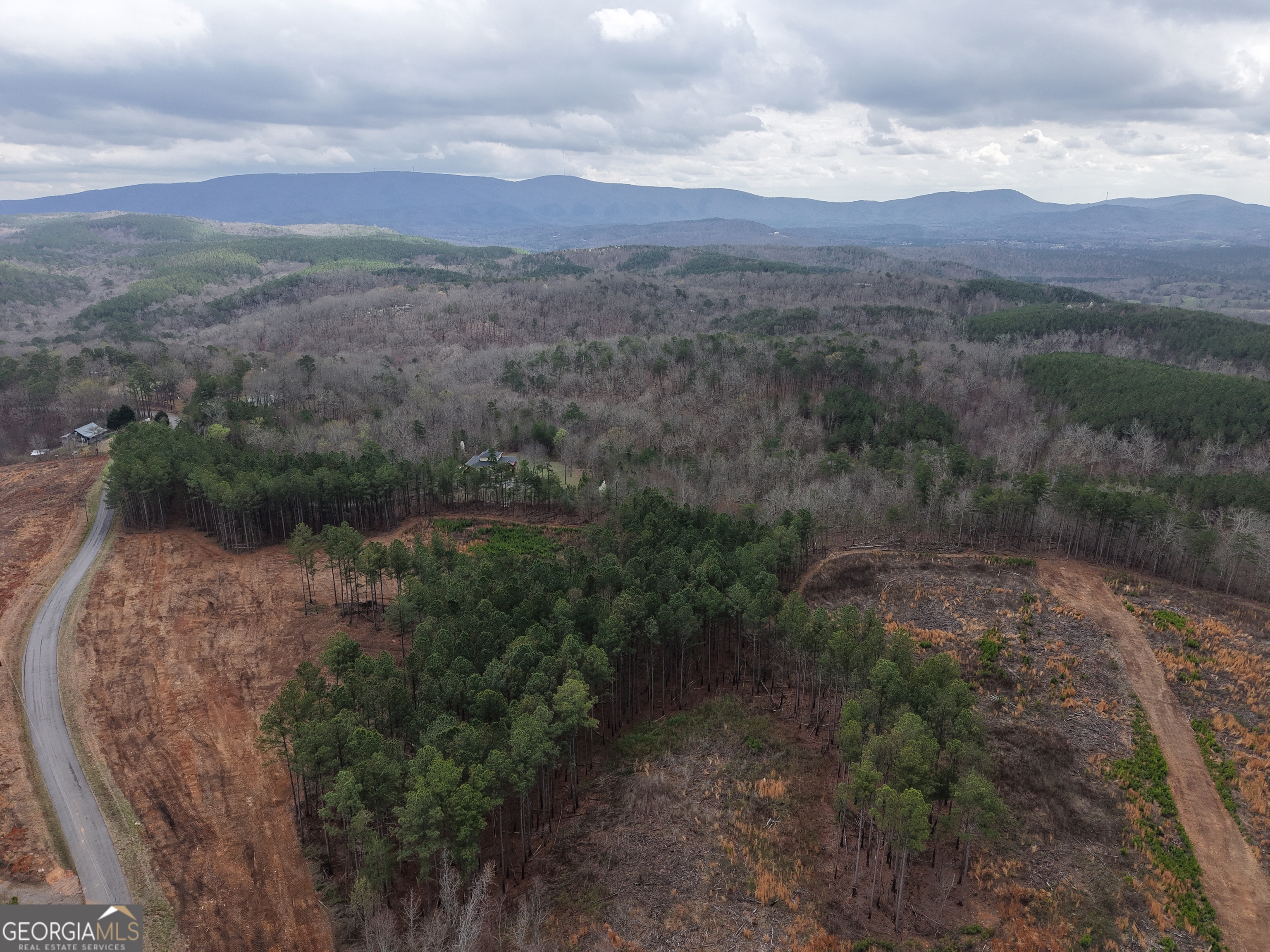 0 Johnson Mountain Road, Unit 7401I Fairmount, GA 30139 - Photo 66 of 76 a view of a town with mountains in the background