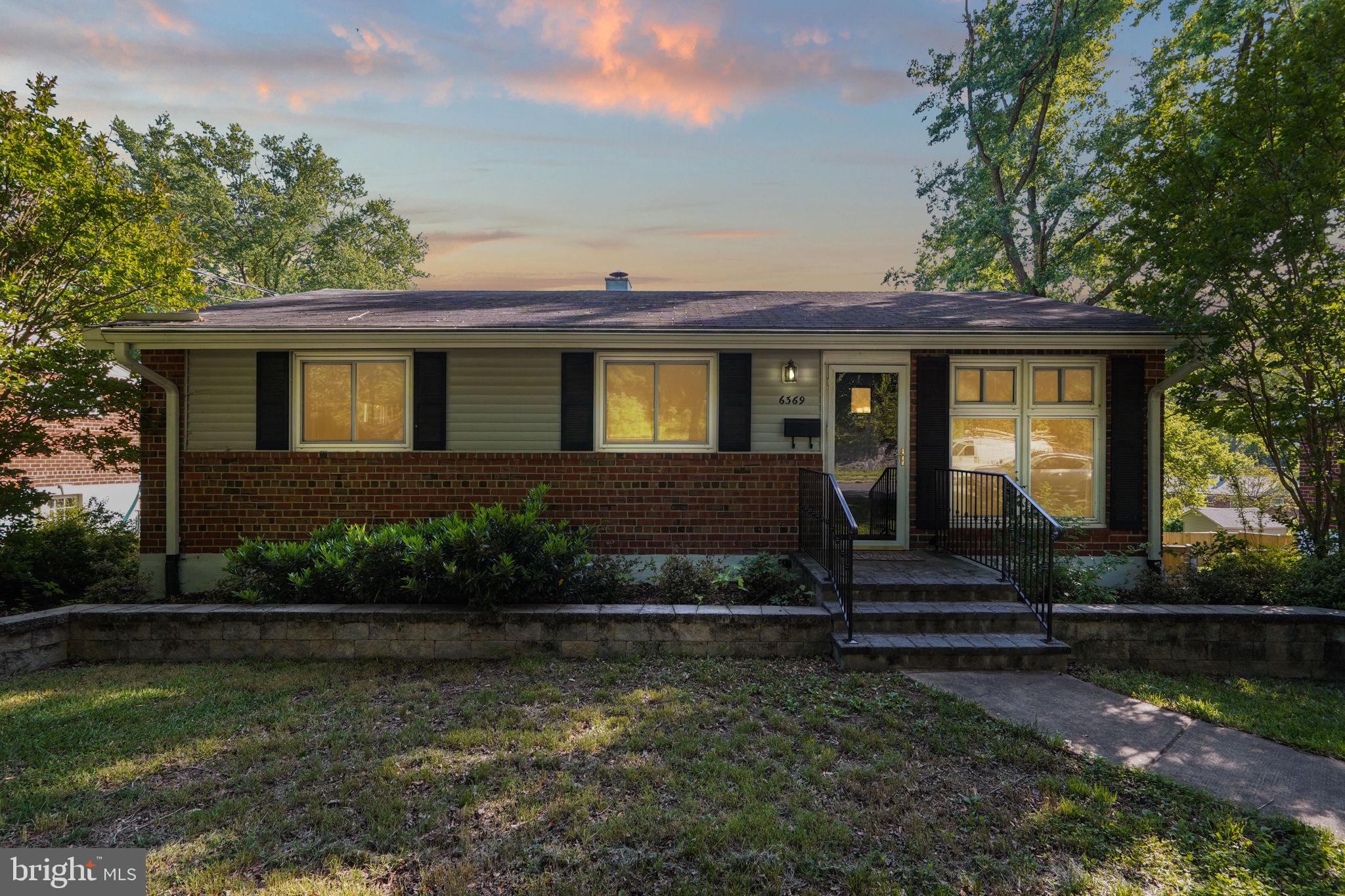6369 Edsall Road Alexandria, VA 22312 - Photo 1 of 33 a front view of a house with a yard