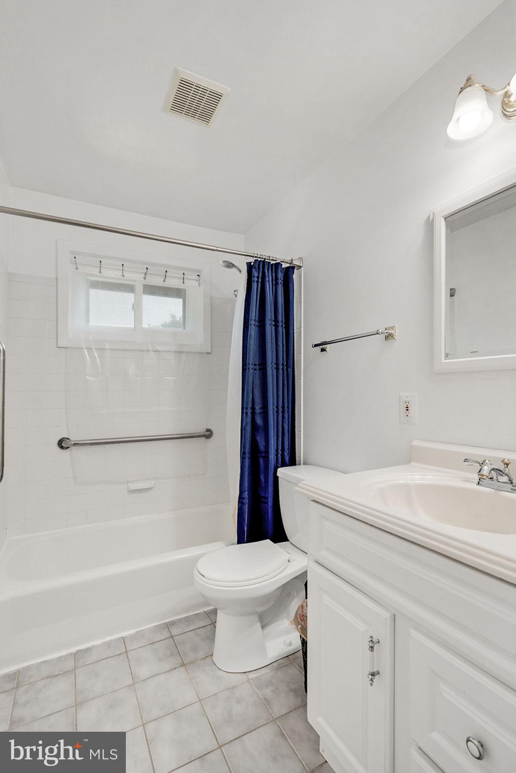 6369 Edsall Road Alexandria, VA 22312 - Photo 15 of 33 a bathroom with a sink a toilet and a shower