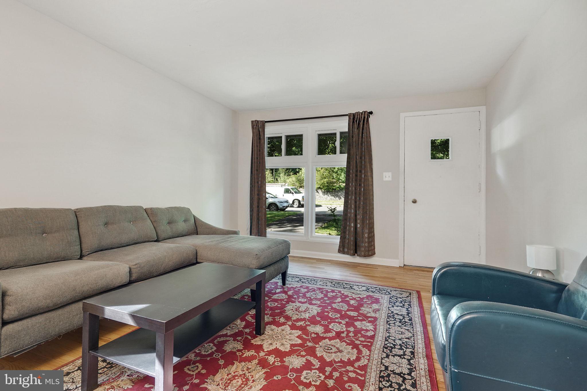 6369 Edsall Road Alexandria, VA 22312 - Photo 17 of 33 a living room with furniture and a window