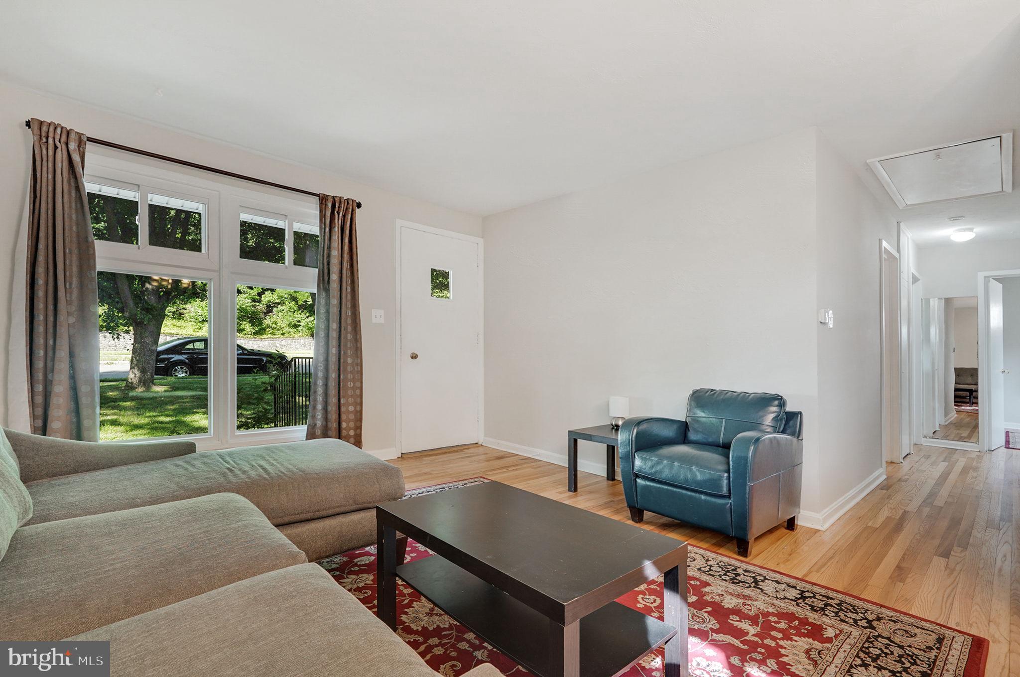 6369 Edsall Road Alexandria, VA 22312 - Photo 18 of 33 a living room with furniture and a window