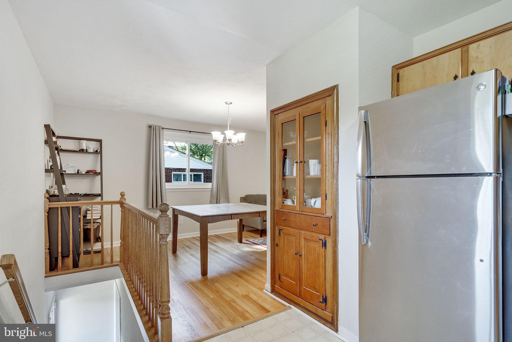 6369 Edsall Road Alexandria, VA 22312 - Photo 22 of 33 a view of kitchen with stainless steel appliances granite countertop cabinets and a dining table