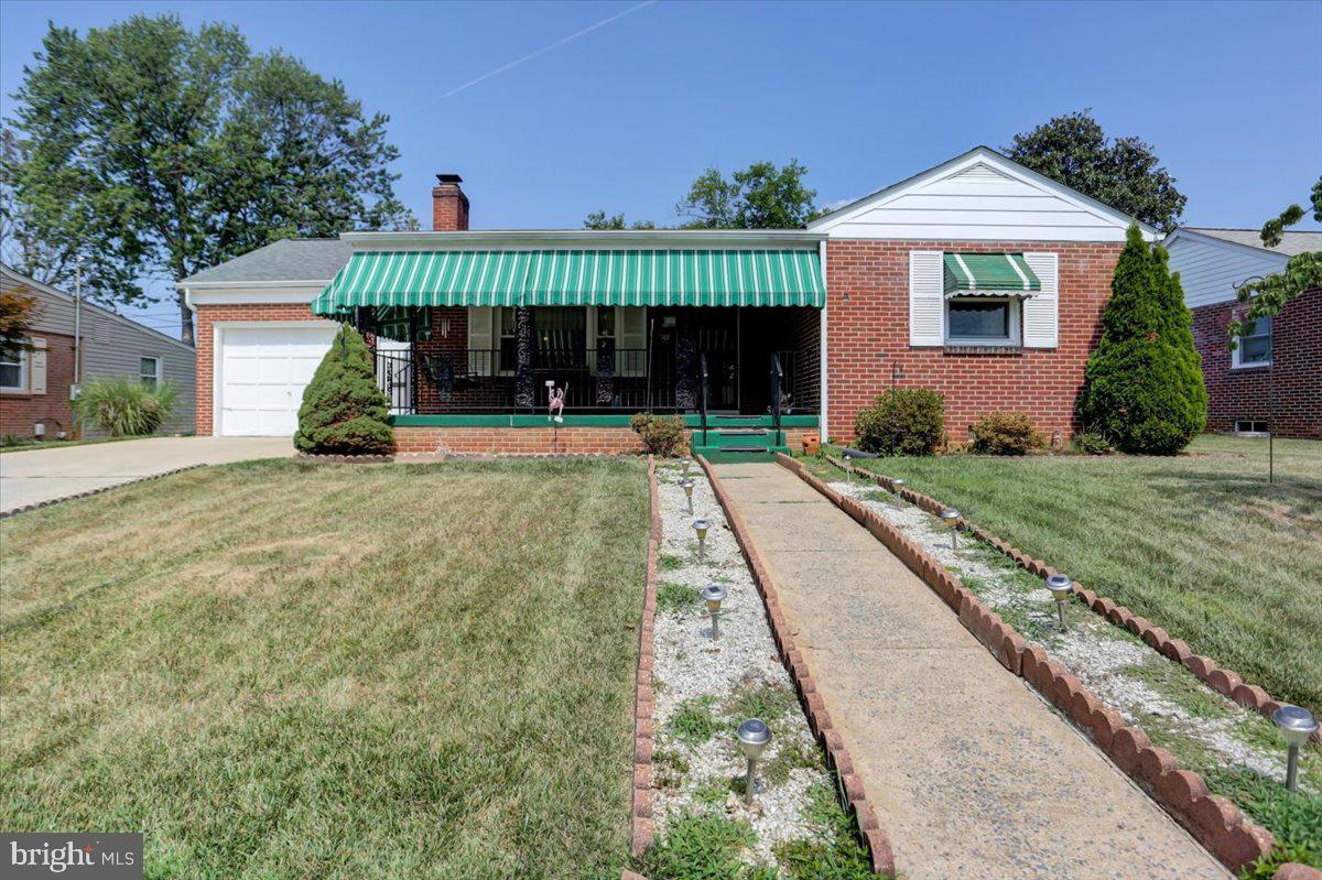 907 Cherokee Trail Frederick, MD 21701 - Photo 1 of 34 a view of a house with a yard