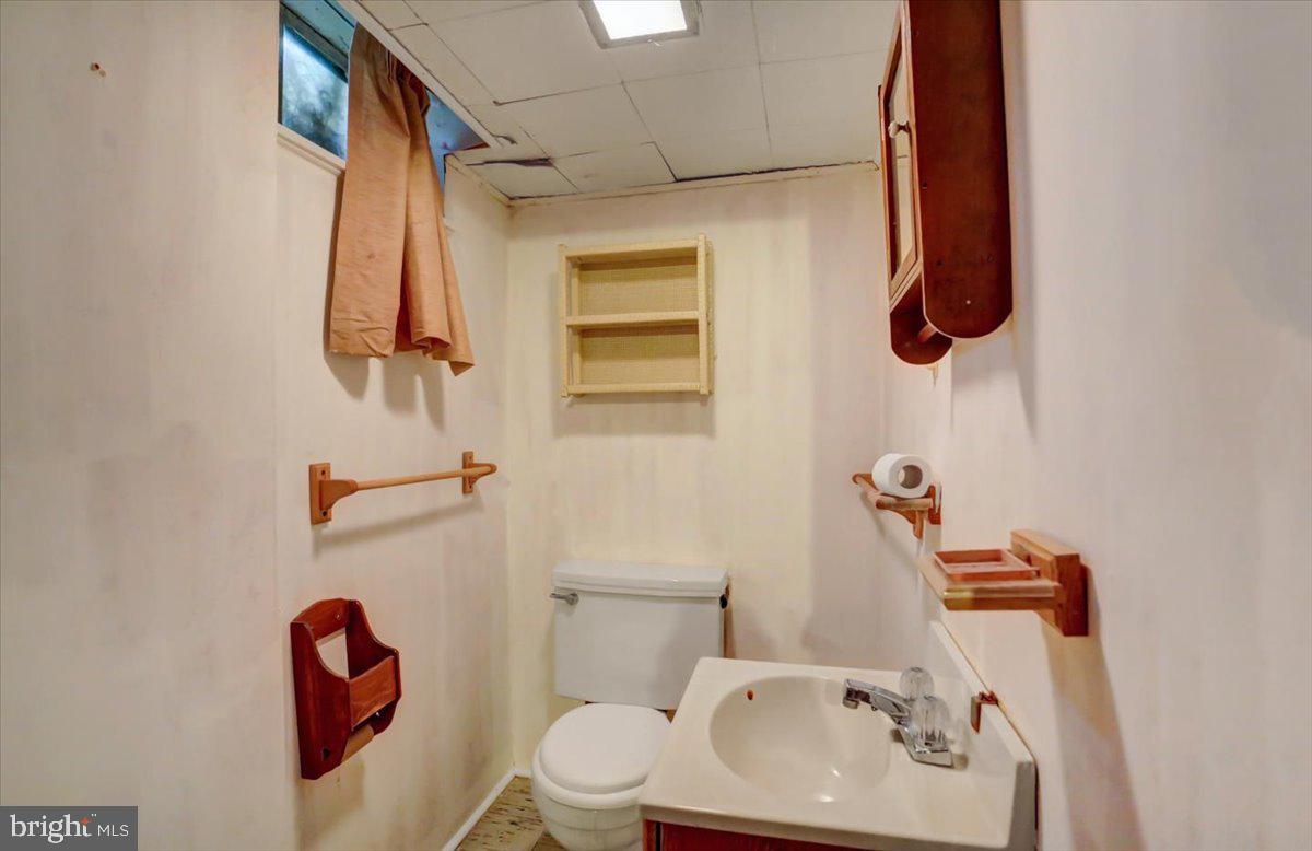 907 Cherokee Trail Frederick, MD 21701 - Photo 23 of 34 a bathroom with a sink and a toilet