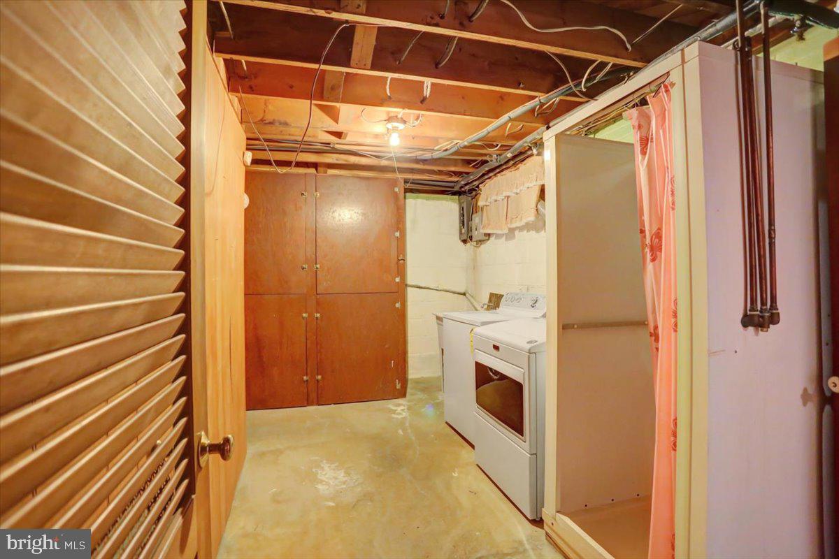 907 Cherokee Trail Frederick, MD 21701 - Photo 24 of 34 a view of entryway with washer and dryer