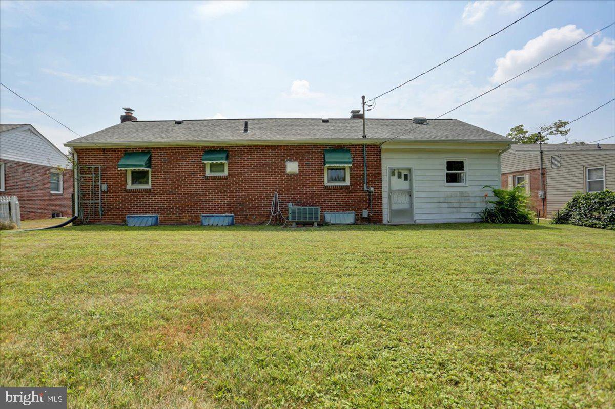 907 Cherokee Trail Frederick, MD 21701 - Photo 32 of 34 a front view of house with yard and trees
