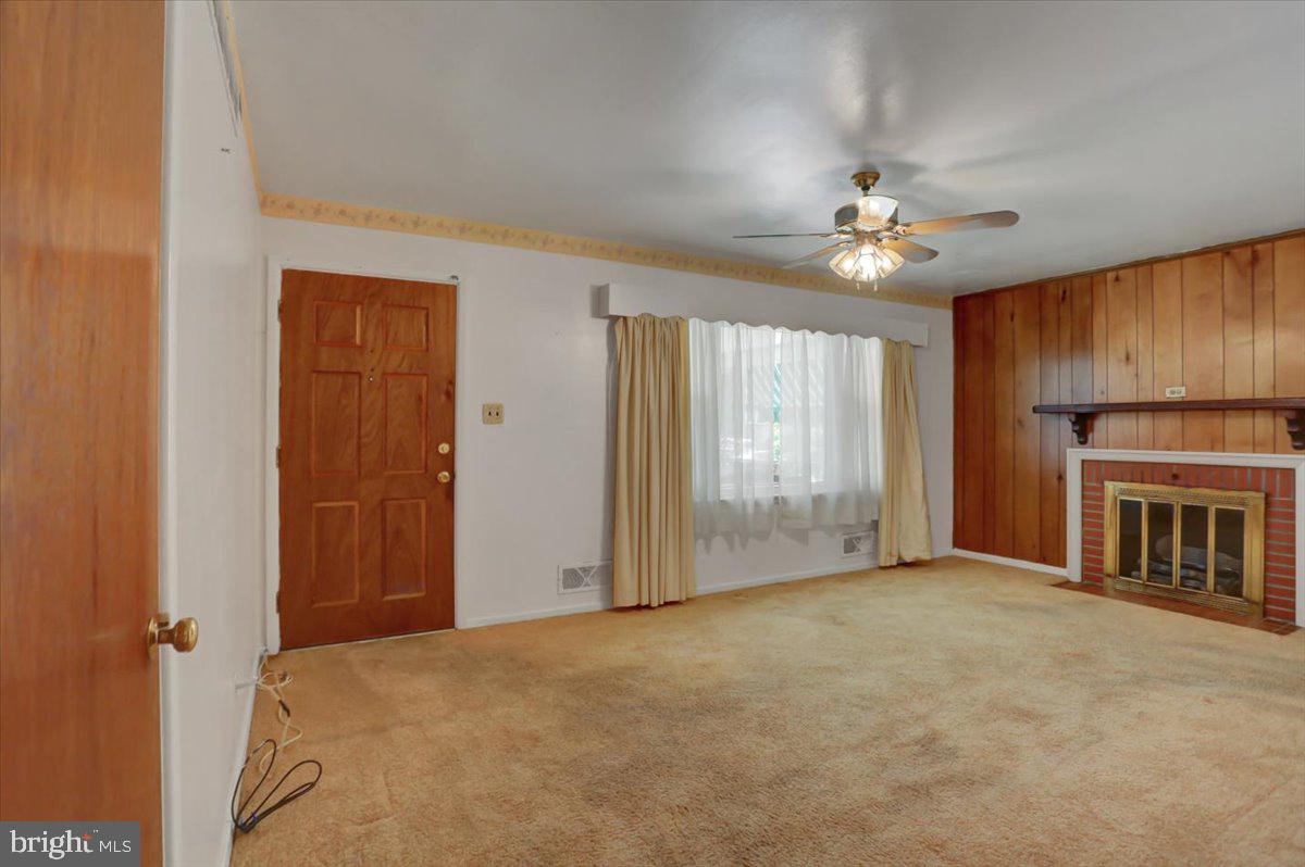 907 Cherokee Trail Frederick, MD 21701 - Photo 7 of 34 a view of an empty room with a fireplace