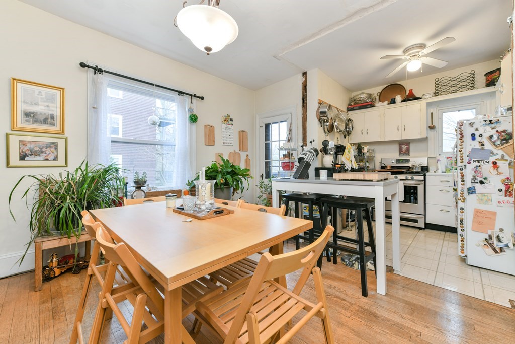 61 Montebello Road Boston, MA 02130 - Photo 19 of 35 a view of a dining room with furniture and wooden floor