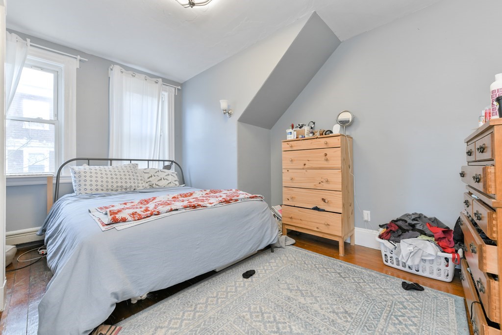 61 Montebello Road Boston, MA 02130 - Photo 26 of 35 a bedroom with a bed and a closet