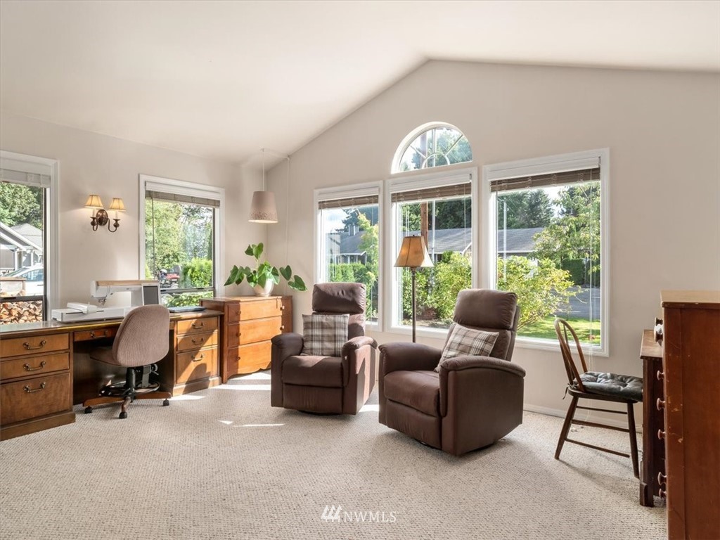 1919 243rd Place Southwest Bothell, WA 98021 - Photo 15 of 39 a living room with furniture and a large window