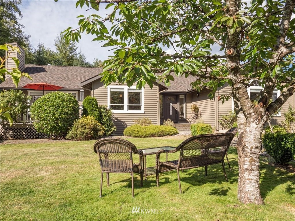 1919 243rd Place Southwest Bothell, WA 98021 - Photo 27 of 39 a view of a house with backyard porch and sitting area