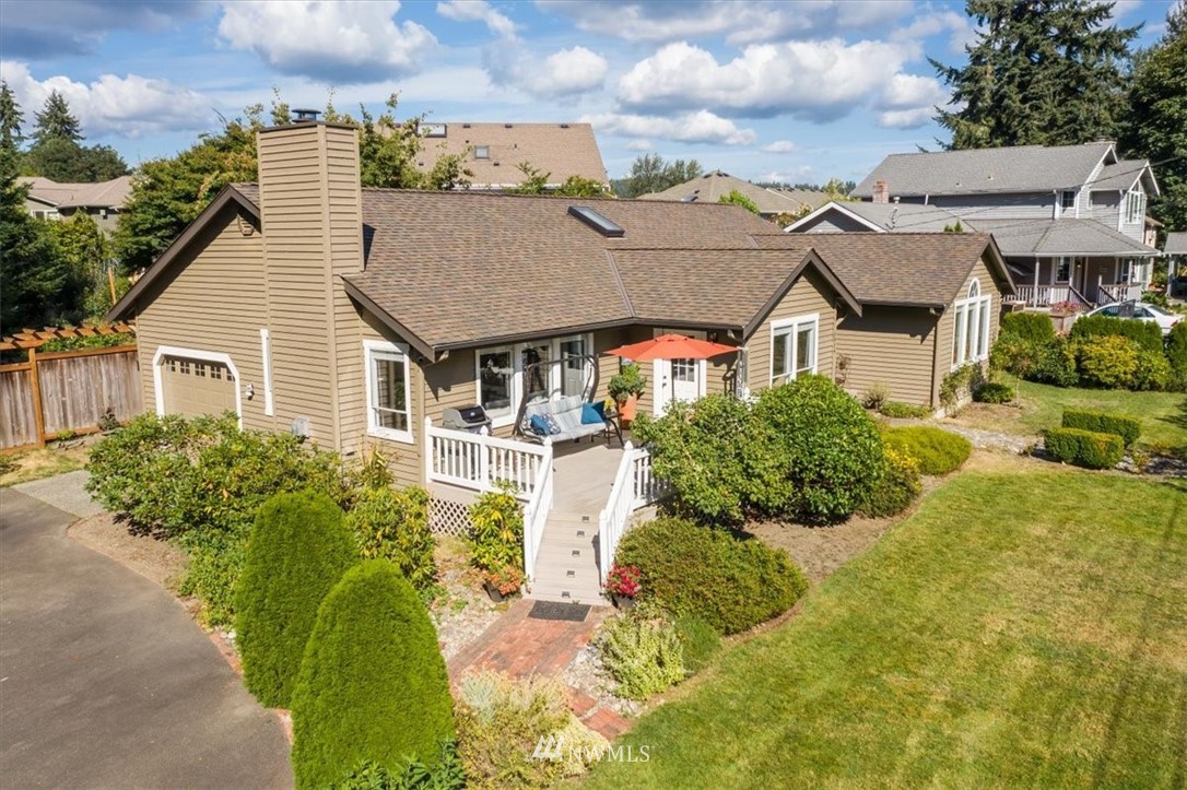 1919 243rd Place Southwest Bothell, WA 98021 - Photo 32 of 39 front view of a house with a yard