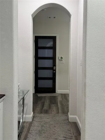 a bathroom with a bathtub and sink