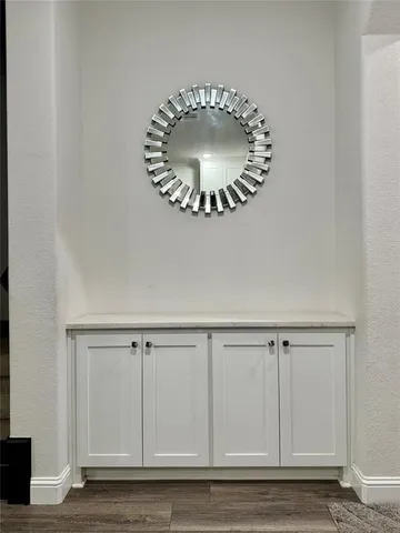 a view of a kitchen from the hallway