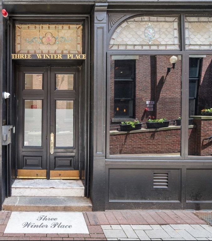 1-3 Winter Place, Unit 3 Boston, MA 02108 - Photo 15 of 23 a view of a entryway door of the house