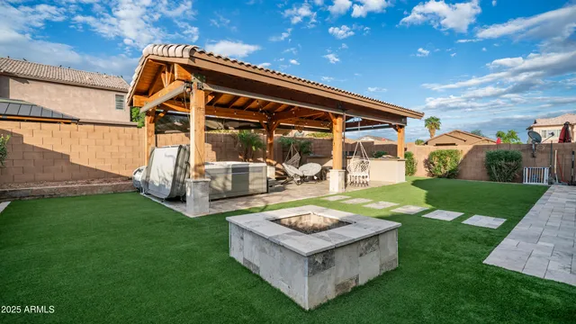 a view of living room with a table and chairs