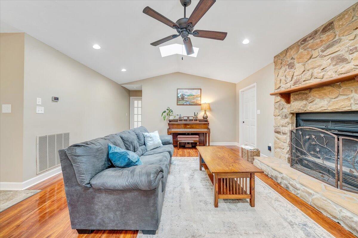 856 Ridge Mountain Drive Boones Mill, VA 24065 - Photo 16 of 66 a living room with furniture and a fireplace