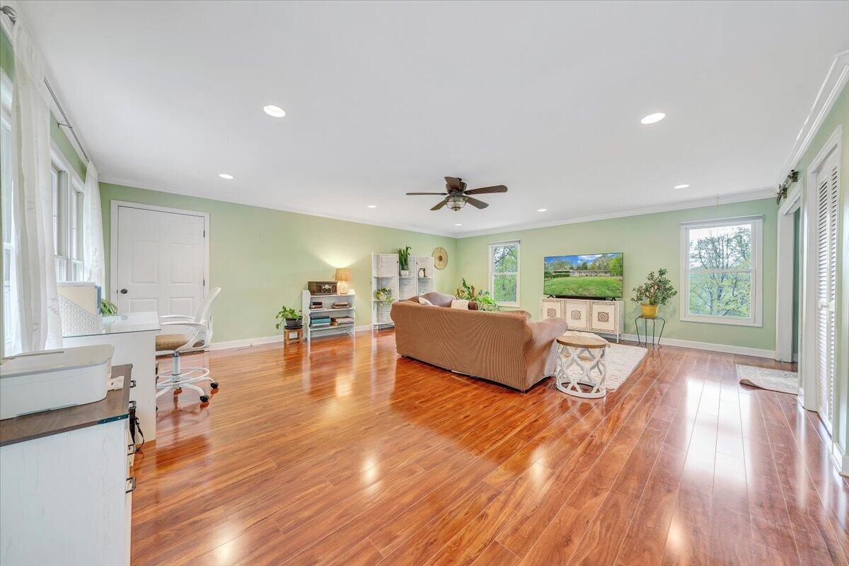 856 Ridge Mountain Drive Boones Mill, VA 24065 - Photo 19 of 66 a living room with furniture and a wooden floor
