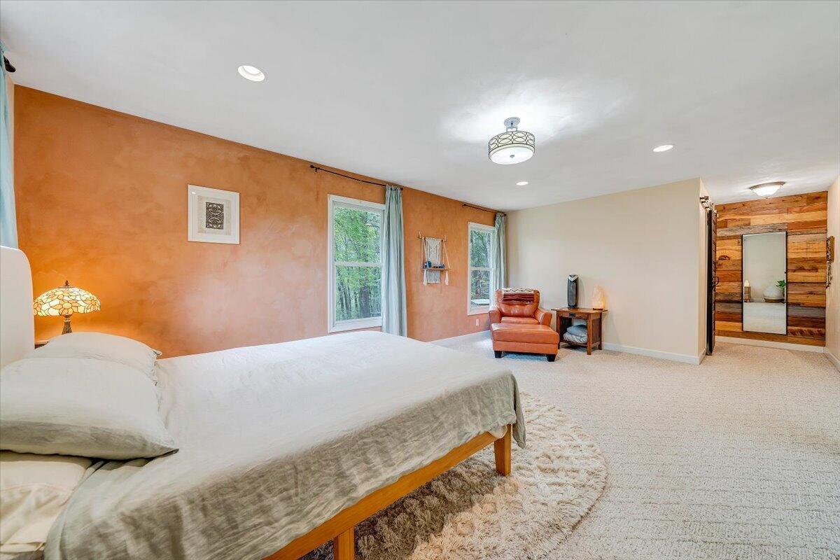 856 Ridge Mountain Drive Boones Mill, VA 24065 - Photo 25 of 66 a bedroom with a bed and furniture