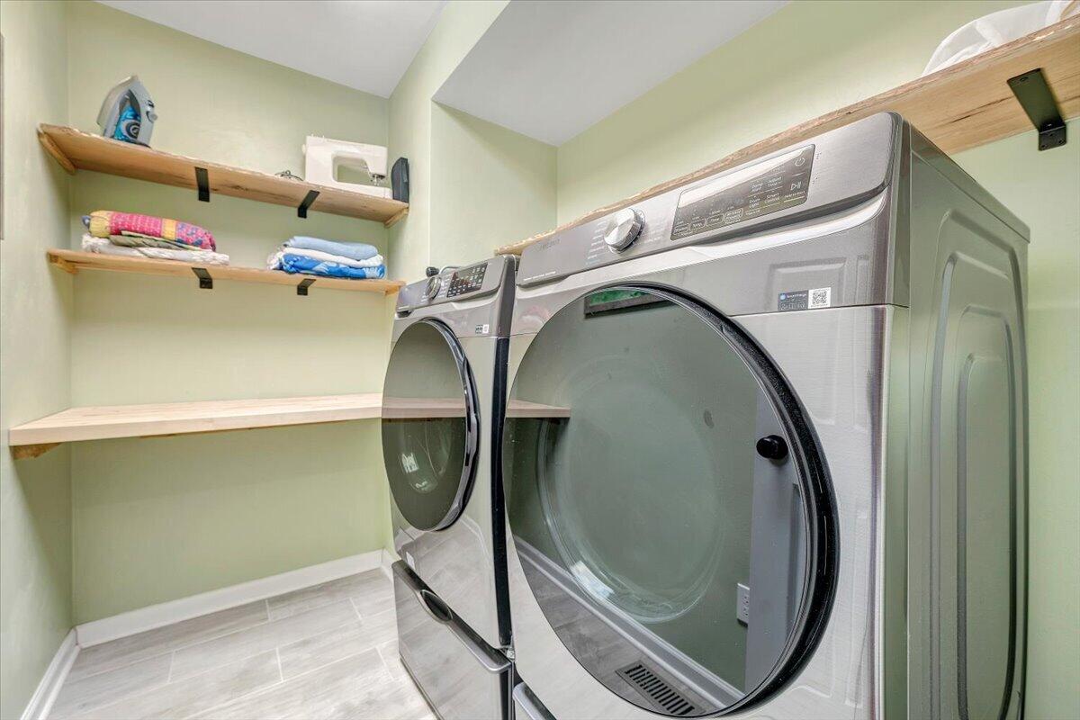 856 Ridge Mountain Drive Boones Mill, VA 24065 - Photo 42 of 66 a utility room with dryer and washer