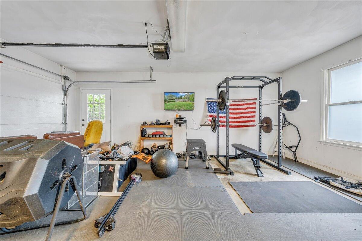 856 Ridge Mountain Drive Boones Mill, VA 24065 - Photo 44 of 66 a view of a room with gym equipment