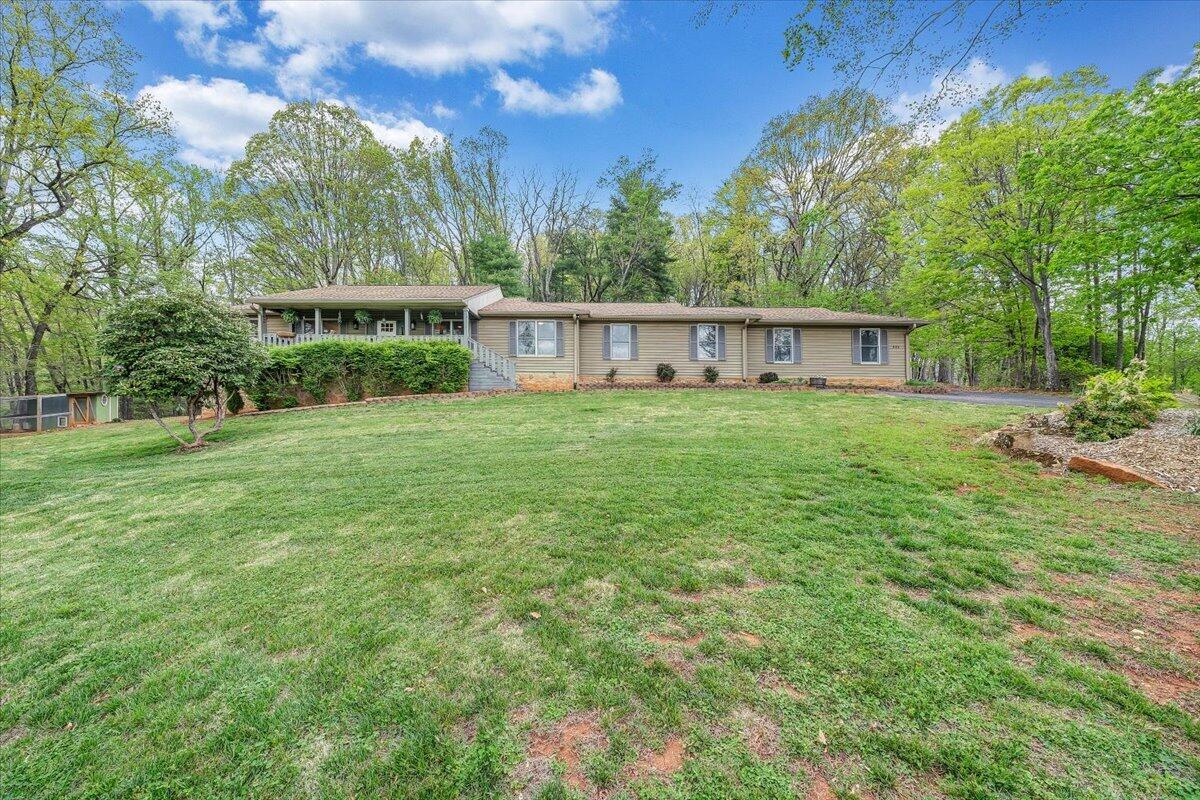 856 Ridge Mountain Drive Boones Mill, VA 24065 - Photo 65 of 66 a view of a house with backyard and garden
