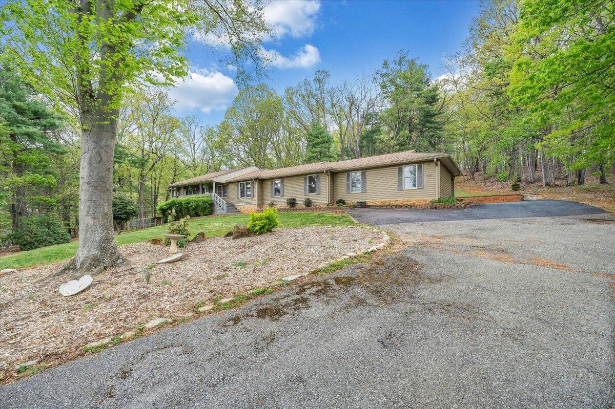 856 Ridge Mountain Drive Boones Mill, VA 24065 - Photo 66 of 66 front view of house with a yard