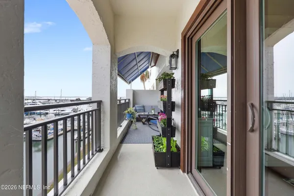 an aerial view of a house with a ocean view