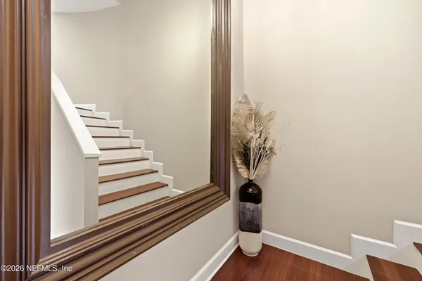 a view of a swimming pool with a table and chairs