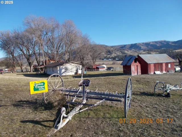 a view of a swimming pool with a yard