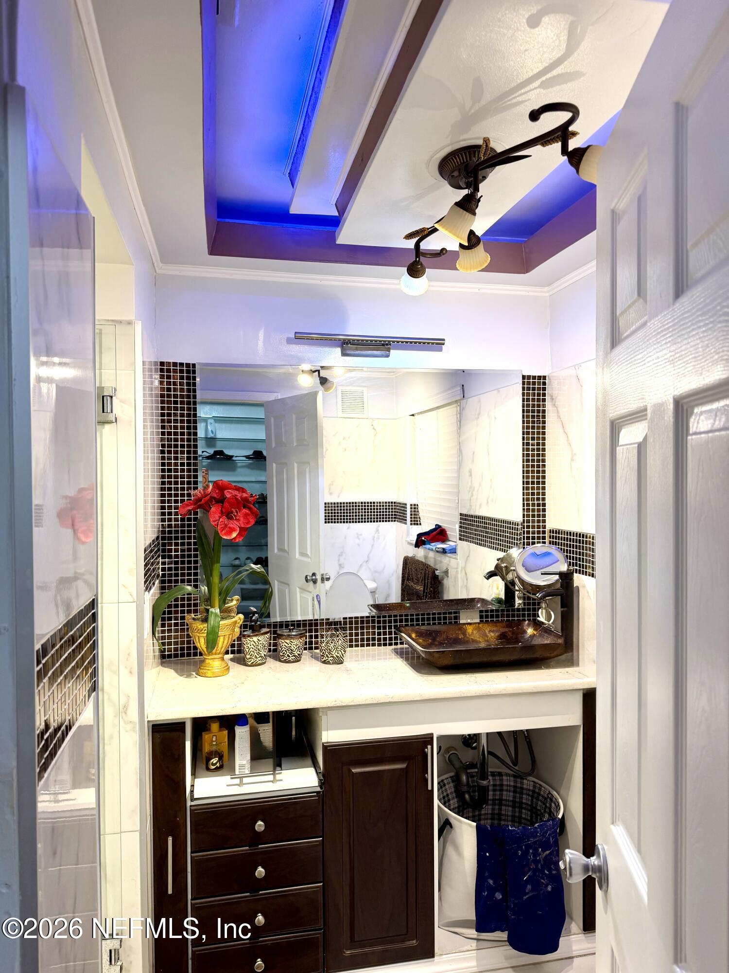 4127 Springwood Road Jacksonville, FL 32207 - Photo 32 of 63 a kitchen with a refrigerator and a stove
