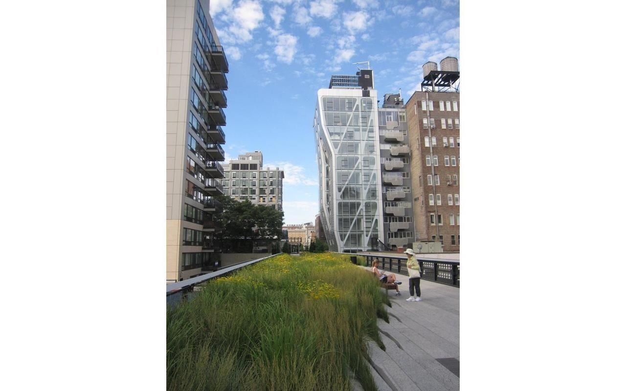 465 West 23rd Street, Unit 3C Manhattan, NY 10011 - Photo 30 of 32 a view of a city room with tall buildings