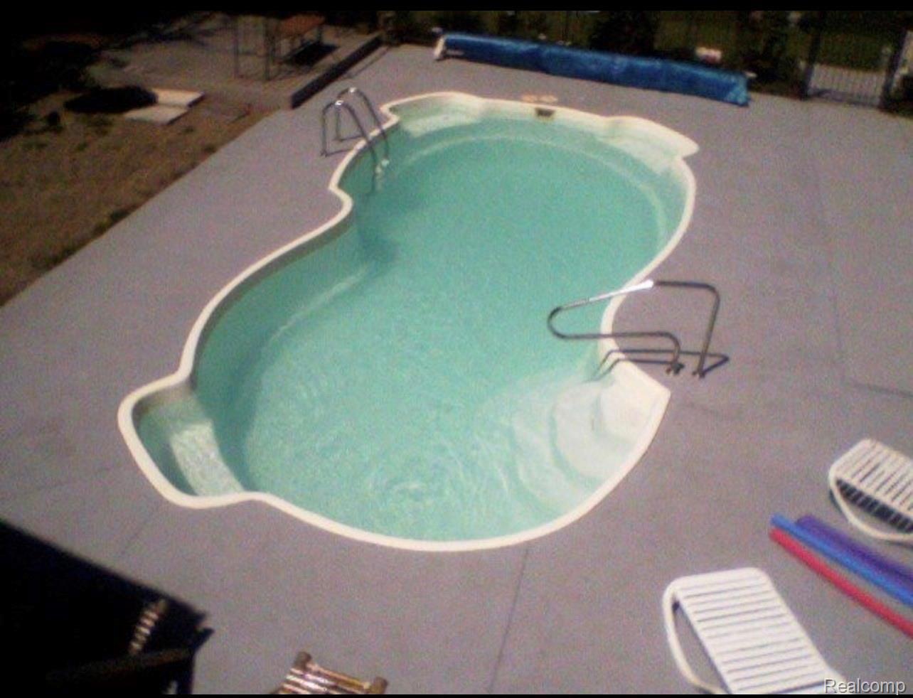 2501 North Hughes Road Howell, MI 48855 - Photo 25 of 29 pool 2.jpg