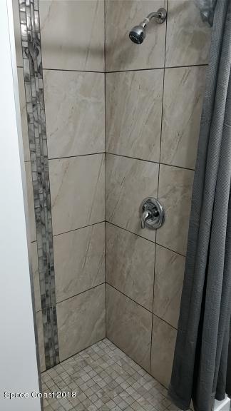 520 Atz Road Malabar, FL 32950 - Photo 3 of 15 a bathroom with a shower