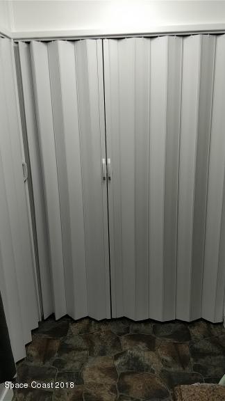 520 Atz Road Malabar, FL 32950 - Photo 5 of 15 a view of a door with wooden floor