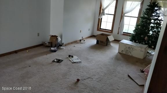 520 Atz Road Malabar, FL 32950 - Photo 8 of 15 a room with storage and utility