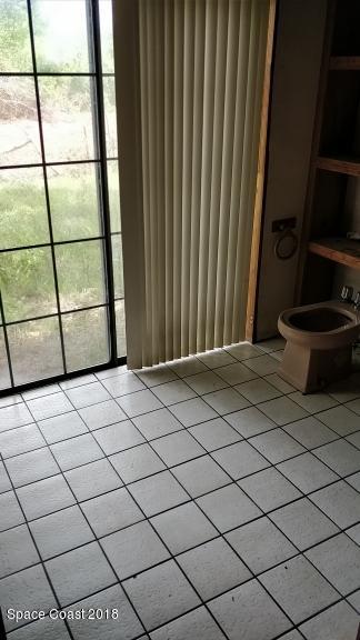 520 Atz Road Malabar, FL 32950 - Photo 10 of 15 a view of a room & utility room