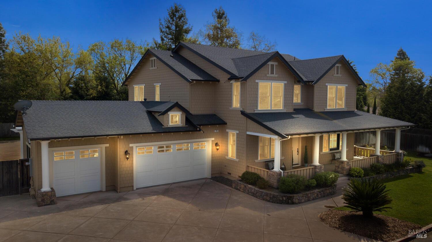 714 Benjamins Road Santa Rosa, CA 95409 - Photo 1 of 1 a front view of a house with a yard and garage