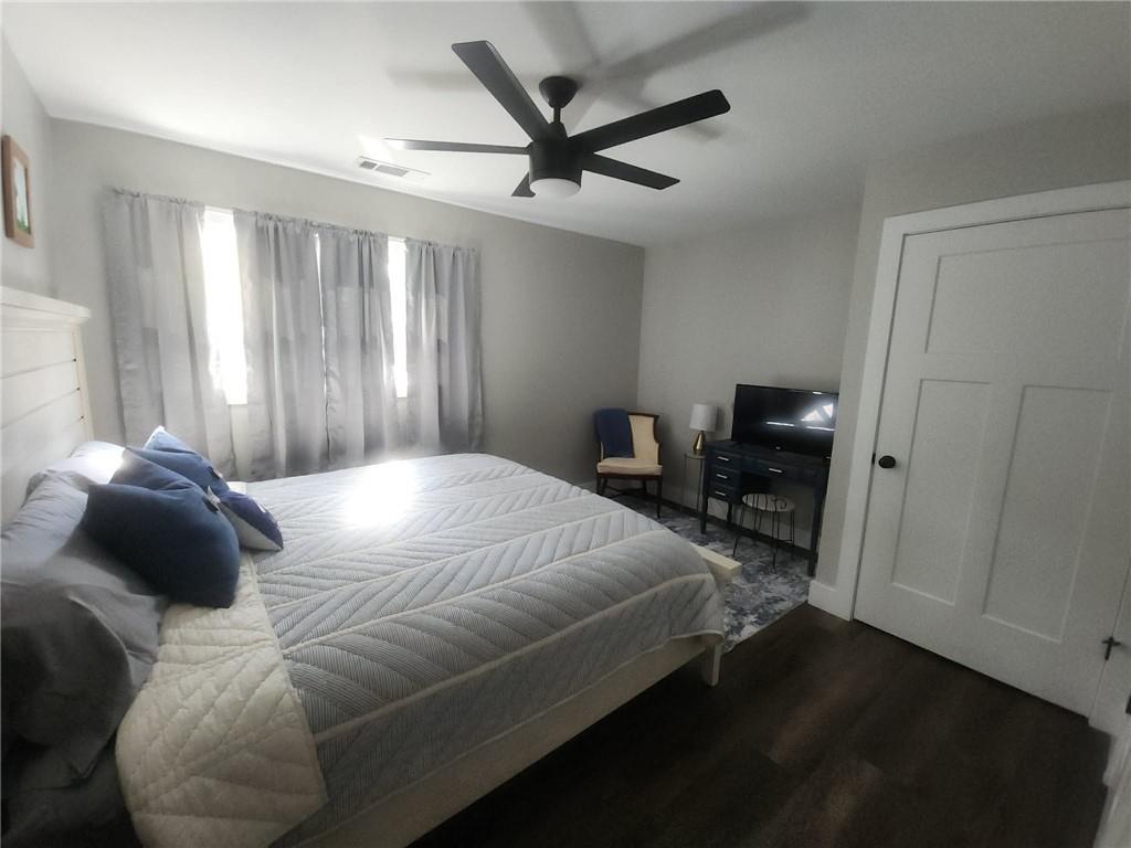 0 Utah Drive Elberton, GA 30635 - Photo 12 of 39 a bedroom with a bed a dresser and a chandelier