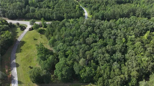 a view of a garden from a balcony