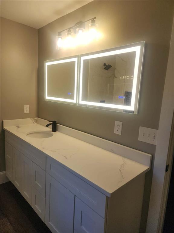 0 Utah Drive Elberton, GA 30635 - Photo 9 of 39 a bathroom with a sink vanity and a mirror