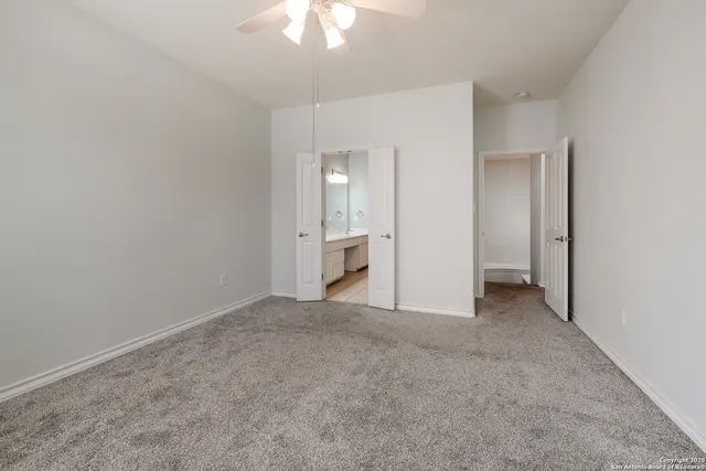 an empty room with a bathroom