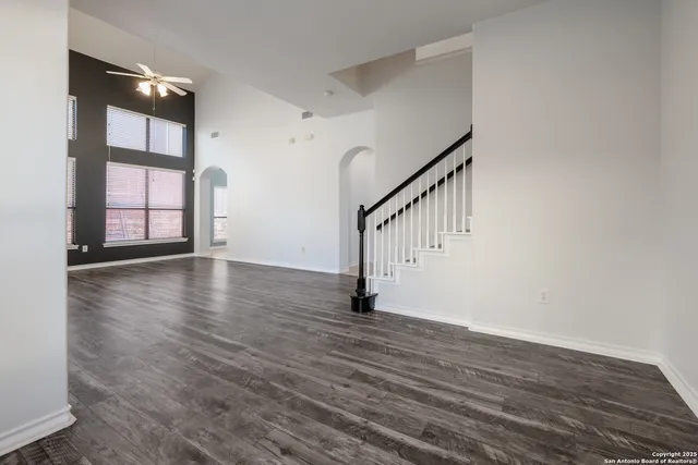 a view of an entryway with wooden floor
